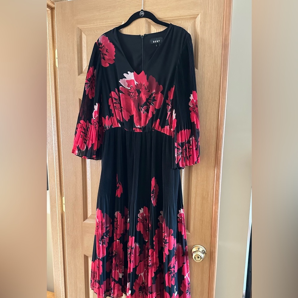 DKNY black and red printed dress with long sleeves and pleated at the bottom
